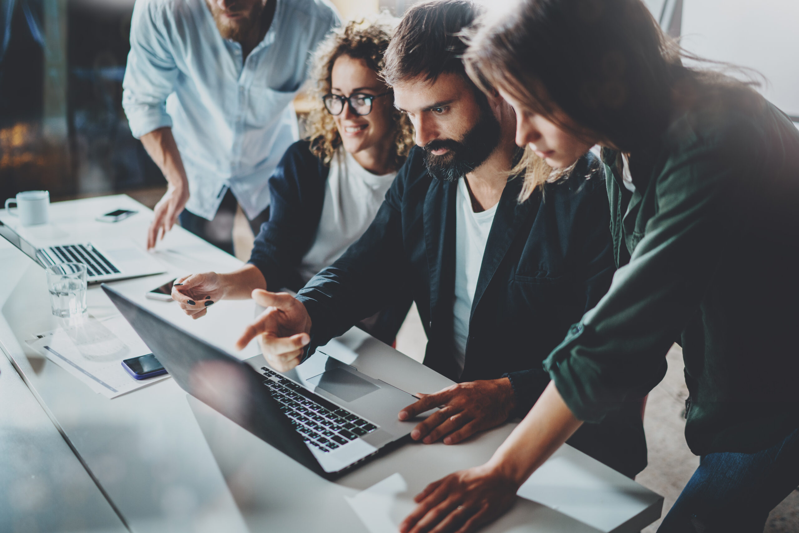 Group of Young Coworkers Work Together Modern Coworking Studio
